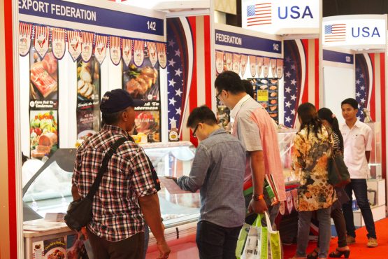 Food, Hotel & Tourism Bali: Visitors viewing premium US meat products.